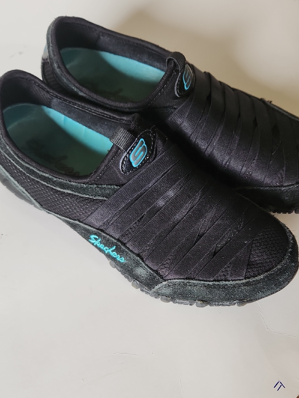 Skechers Black Slip-On Sneakers with Teal Accents